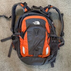 THE NORTHFACE BACKPACK BLACK AND ORANGE ADJUSTABLE GOOD CONDITION